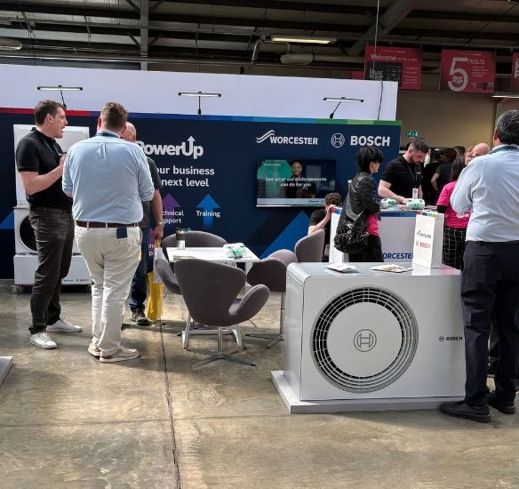 Heat pump stand with people talking